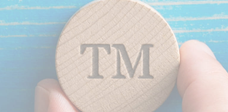 A close up of a round with "TM" letters on it